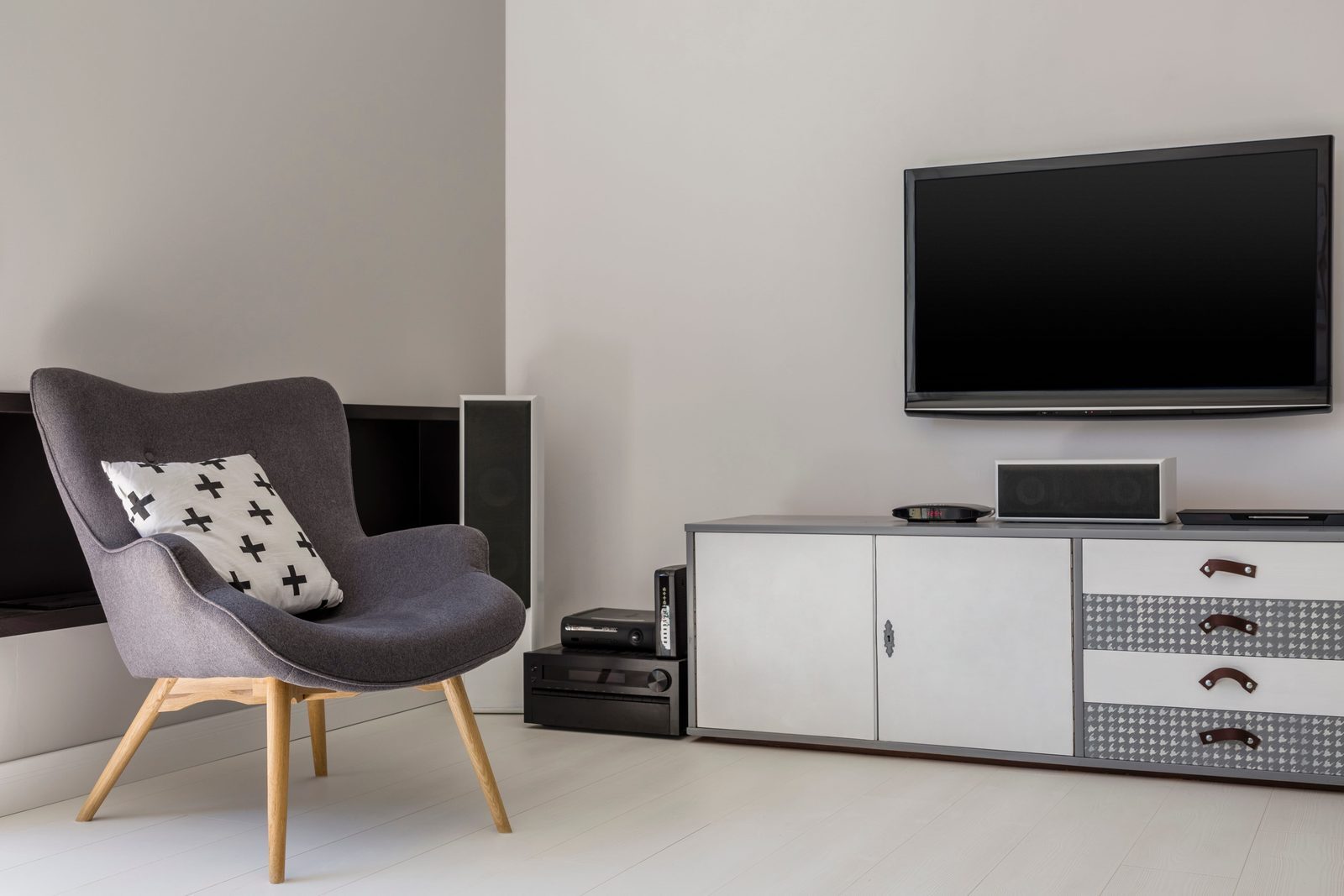Smart TV installed and set up in a modern lounge with cables neatly concealed
